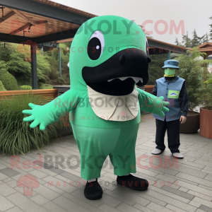 Green Killer Whale mascot costume character dressed with a Romper and Pocket squares