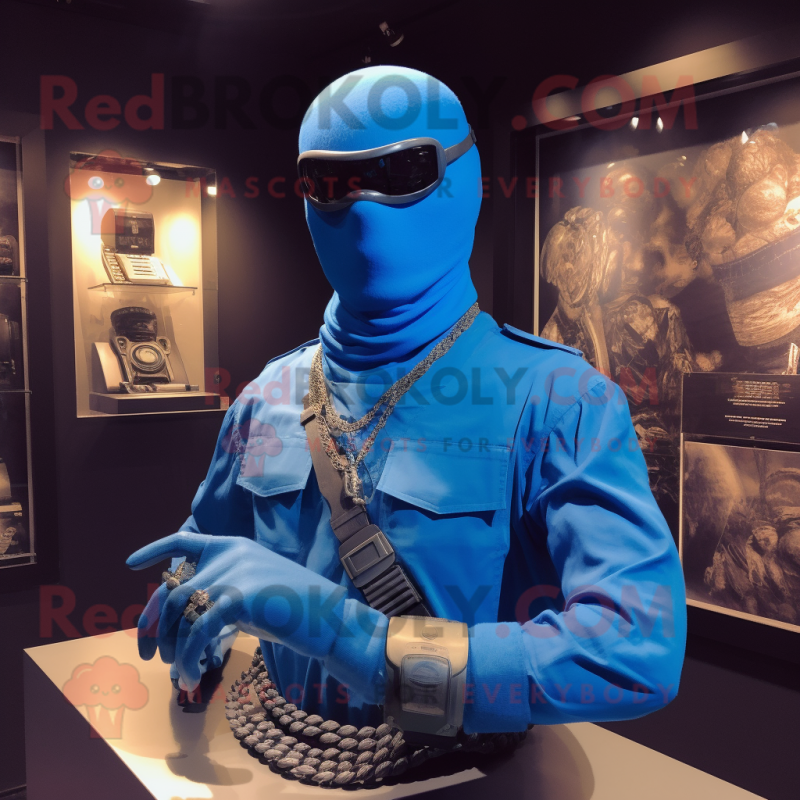 Blue Gi Joe mascot costume character dressed with a Wrap Skirt and Necklaces Blue Gi Joe mascot costume character dressed with a Wrap Skirt and Necklaces