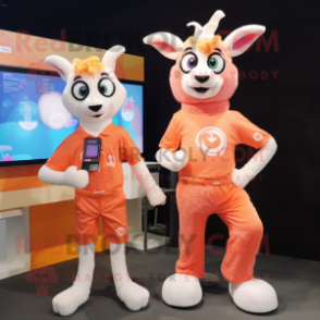 Peach Goat mascot costume character dressed with a T-Shirt and Digital watches