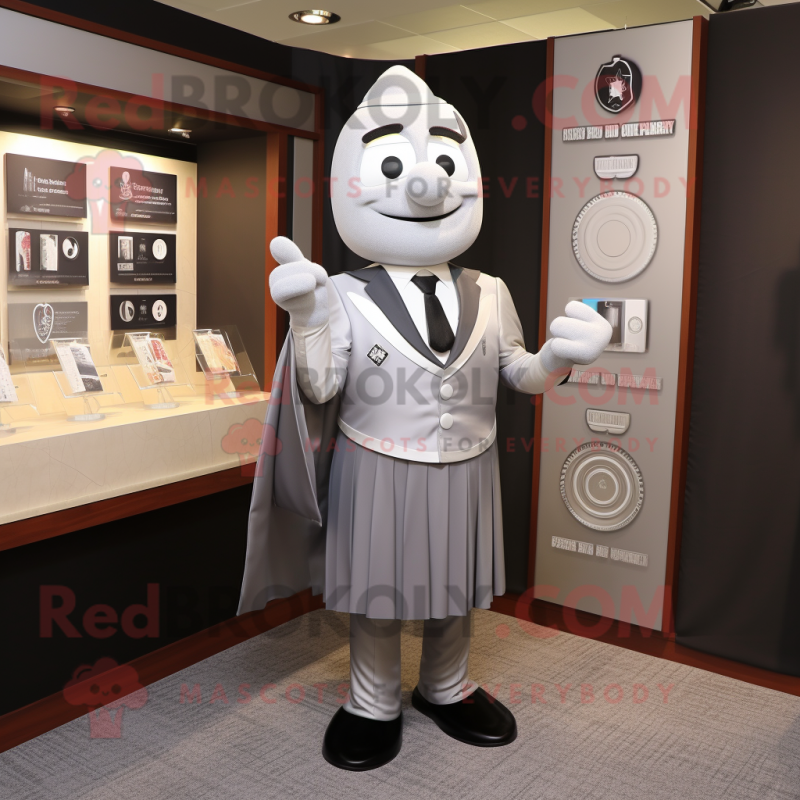 Silver Attorney mascot costume character dressed with a Shift Dress and Cufflinks