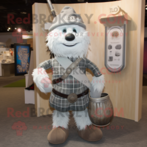 Silver Bagpipe mascot costume character dressed with a Corduroy Pants and Handbags