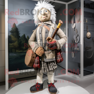 Silver Bagpipe mascot costume character dressed with a Corduroy Pants and Handbags