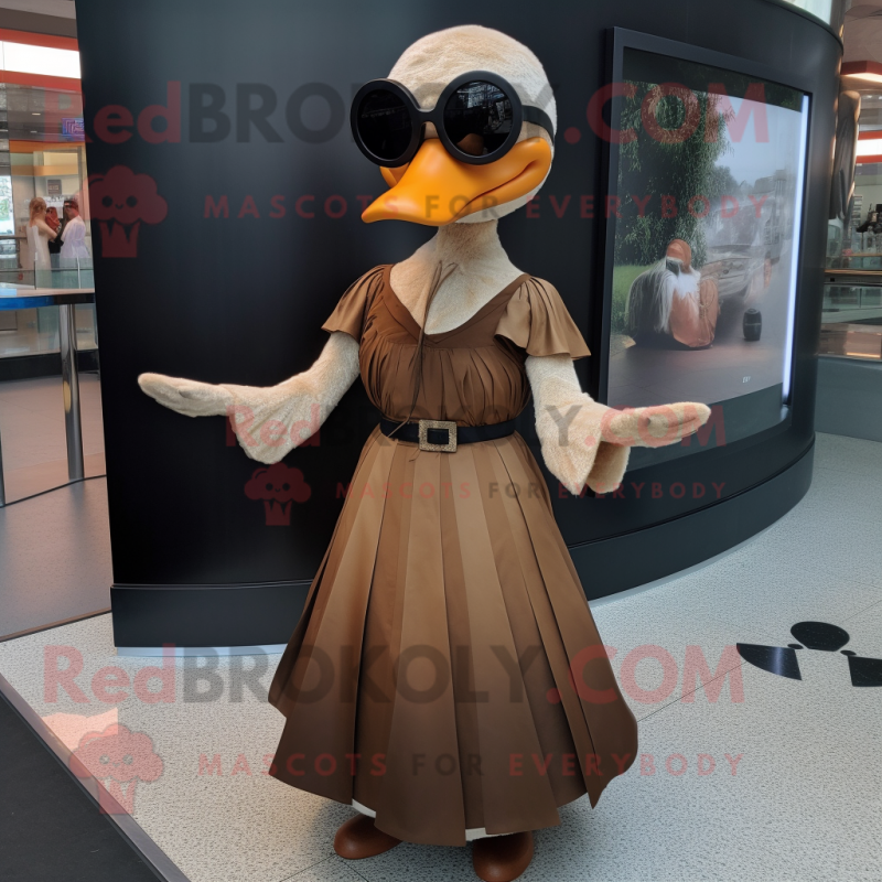 Brown Swan mascot costume character dressed with a A-Line Skirt and Sunglasses Brown Swan mascot costume character dressed with a A-Line Skirt and Sunglasses