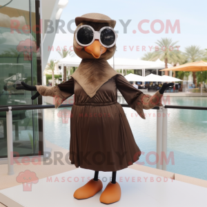 Brown Swan mascot costume character dressed with a A-Line Skirt and Sunglasses