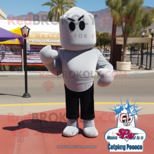 Gray Boxing Glove mascot costume character dressed with a Pencil Skirt and Shawl pins