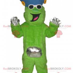 Funny neon green character mascot with a blue hat -