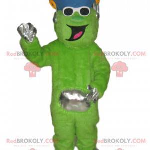 Funny neon green character mascot with a blue hat -