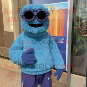 Blue Jambalaya mascot costume character dressed with a Sweater and Sunglasses