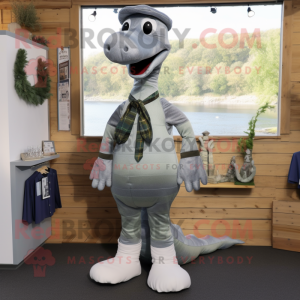 Silver Loch Ness Monster mascot costume character dressed with a Oxford Shirt and Hairpins