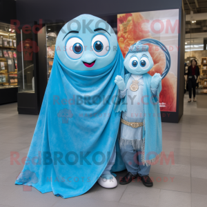Turquoise Engagement Ring mascot costume character dressed with a Boyfriend Jeans and Shawls