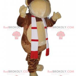 Mascote macaco engraçado com um lenço vermelho e verde -