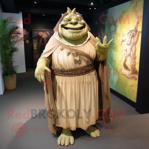 Tan Ogre mascot costume character dressed with a Maxi Dress and Wraps