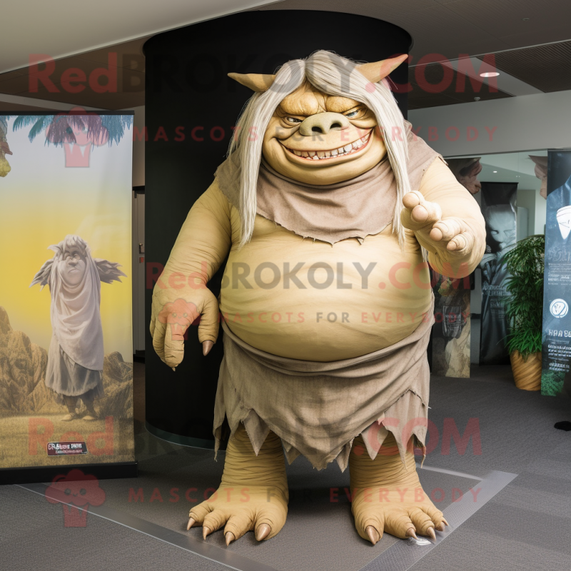 Tan Ogre mascot costume character dressed with a Maxi Dress and Wraps Tan Ogre mascot costume character dressed with a Maxi Dress and Wraps