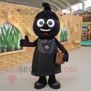 Black Onion mascot costume character dressed with a Dungarees and Coin purses