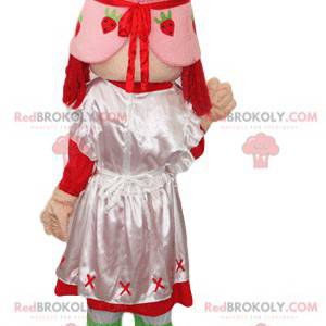 Mascota Strawberry Charlotte con un vestido y un sombrero rosa