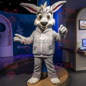 Silver Gazelle mascot costume character dressed with a Sweatshirt and Rings