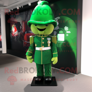Green British Royal Guard mascot costume character dressed with a Windbreaker and Lapel pins