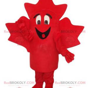 Mascotte de feuille d'érable rouge très souriante -