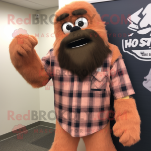Peach Sasquatch mascot costume character dressed with a Flannel Shirt and Tie pins