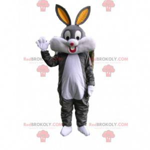 Mascote coelho cinza e branco muito feliz com orelhas grandes -