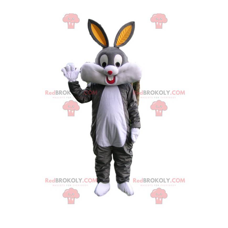 Veldig glad grå og hvit kaninmaskot med store ører -