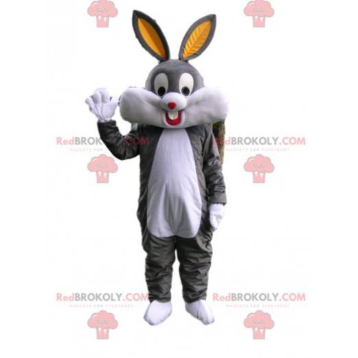 Mascotte de lapin gris et blanc très heureux avec de grandes