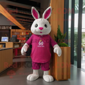 Magenta Rabbit mascot costume character dressed with a Graphic Tee and Tote bags