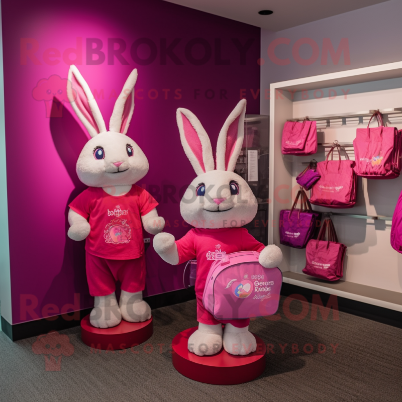 Magenta Rabbit mascot costume character dressed with a Graphic Tee and Tote bags