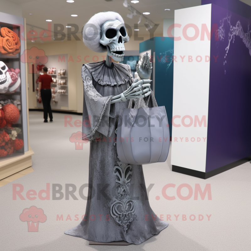 Silver Graveyard mascot costume character dressed with a Evening Gown and Tote bags Silver Graveyard mascot costume character dressed with a Evening Gown and Tote bags