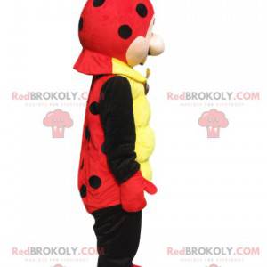 Mascot red and black ladybug with a small round muzzle -