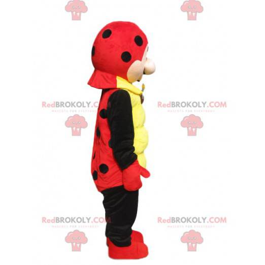 Mascot red and black ladybug with a small round muzzle -