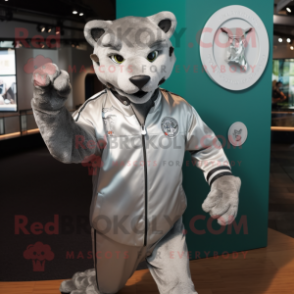 Silver Puma mascot costume character dressed with a Windbreaker and Cufflinks