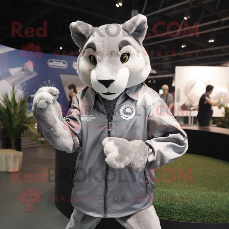 Silver Puma mascot costume character dressed with a Windbreaker and Cufflinks Silver Puma mascot costume character dressed with a Windbreaker and Cufflinks