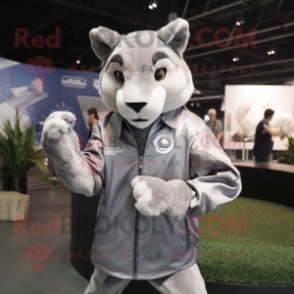 Silver Puma mascot costume character dressed with a Windbreaker and Cufflinks