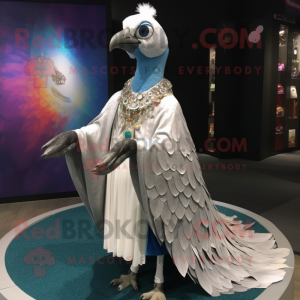 Silver Peacock mascot costume character dressed with a V-Neck Tee and Shawl pins