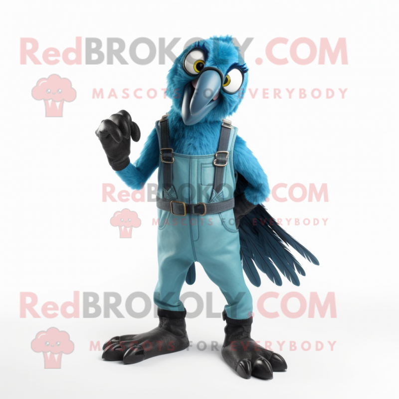 Cyan Vulture mascot costume character dressed with a Dungarees and Rings Cyan Vulture mascot costume character dressed with a Dungarees and Rings