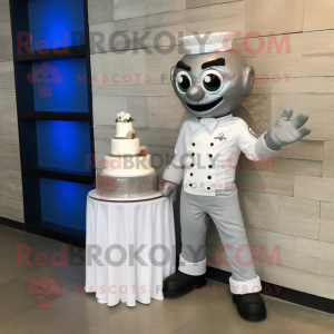 Silver Wedding Cake mascot costume character dressed with a Polo Shirt and Rings
