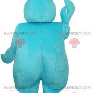 Smiling turquoise snowman mascot, with big pliers -