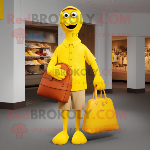 Yellow Aglet mascot costume character dressed with a Henley Tee and Handbags
