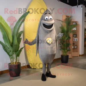 Gray Banana mascot costume character dressed with a Sheath Dress and Lapel pins