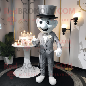 Silver Scented Candle mascot costume character dressed with a Suit Pants and Berets