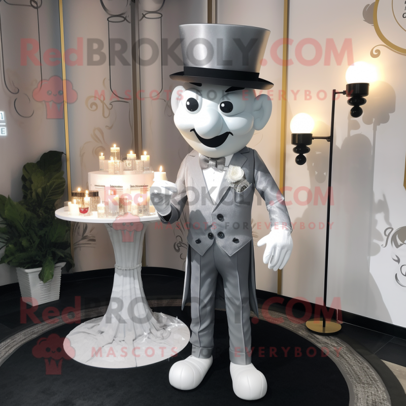 Silver Scented Candle mascot costume character dressed with a Suit Pants and Berets Silver Scented Candle mascot costume character dressed with a Suit Pants and Berets