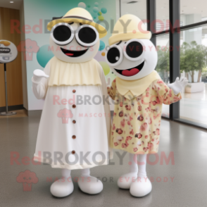 Cream Cyclops mascot costume character dressed with a Maxi Dress and Berets