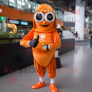 Orange Aglet mascot costume character dressed with a Cover-up and Smartwatches