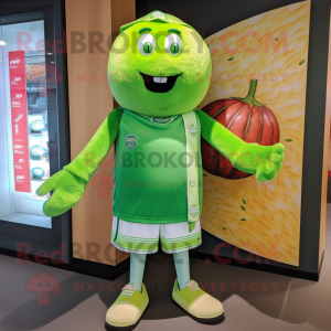 Lime Green Watermelon mascot costume character dressed with a Rugby Shirt and Shawl pins