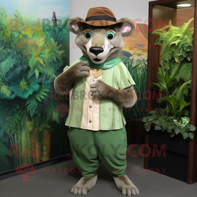 Green Thylacosmilus mascot costume character dressed with a Blouse and Hats Green Thylacosmilus mascot costume character dressed with a Blouse and Hats