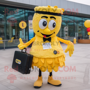 Yellow Paella mascot costume character dressed with a Blouse and Briefcases