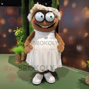 Brown Golf Ball mascot costume character dressed with a Wedding Dress and Reading glasses