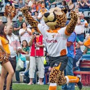 Mascotte de guépard de léopard en tenue de sport -