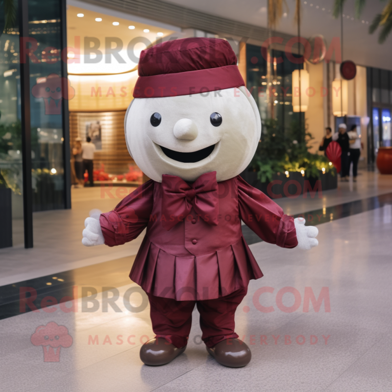 Maroon Dim Sum mascot costume character dressed with a Chinos and Bow ties Maroon Dim Sum mascot costume character dressed with a Chinos and Bow ties